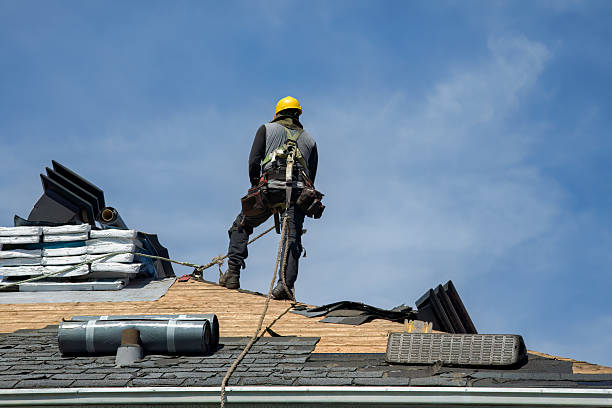 Professional Roofing technician working in Monterey, CA
